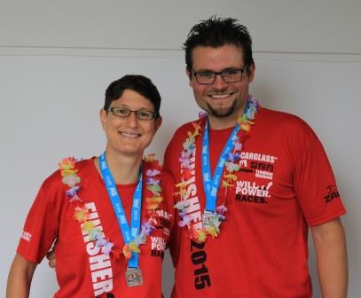 Caroline Marcon and Stefan Hey with their medals for conquering.